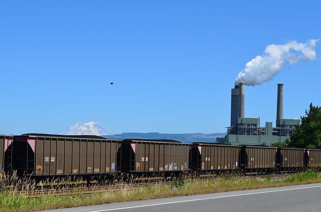 coal train in front of power plant