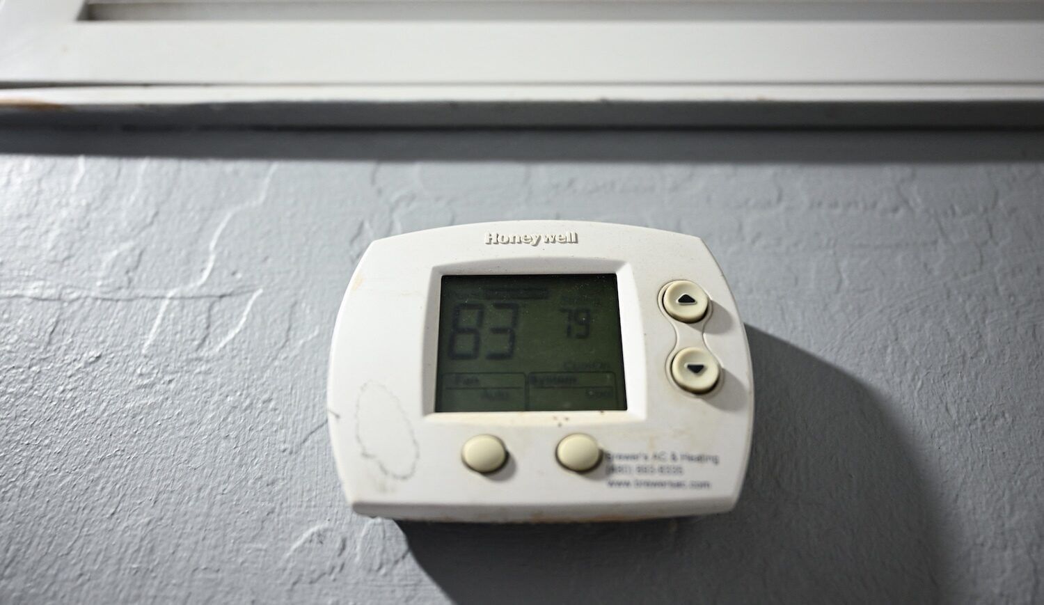 Close-up of Honeywell thermostat on wall