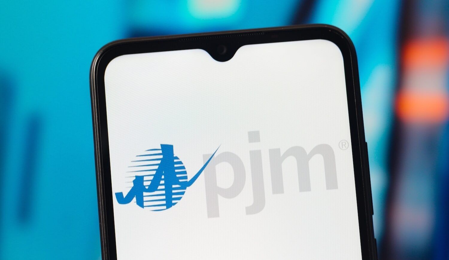 PJM logo on phone screen in blue and gray with white background