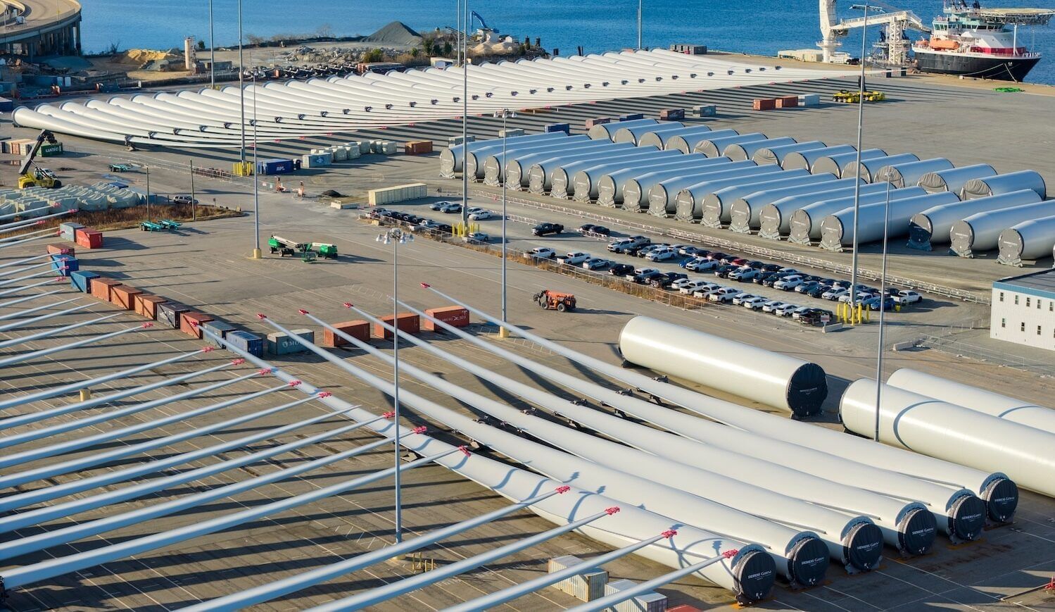Aerial view of wind turbine equipment on a large lot